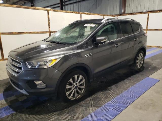 Image 1 of 2017 FORD ESCAPE TITANIUM 2017 with VIN 1FMCU9JD4HUB55870