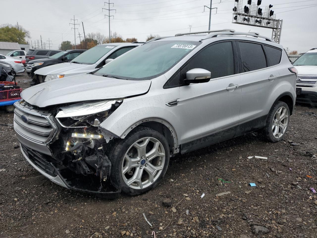 Image 1 of 2017 FORD ESCAPE TITANIUM 2017 with VIN 1FMCU0J96HUE86151